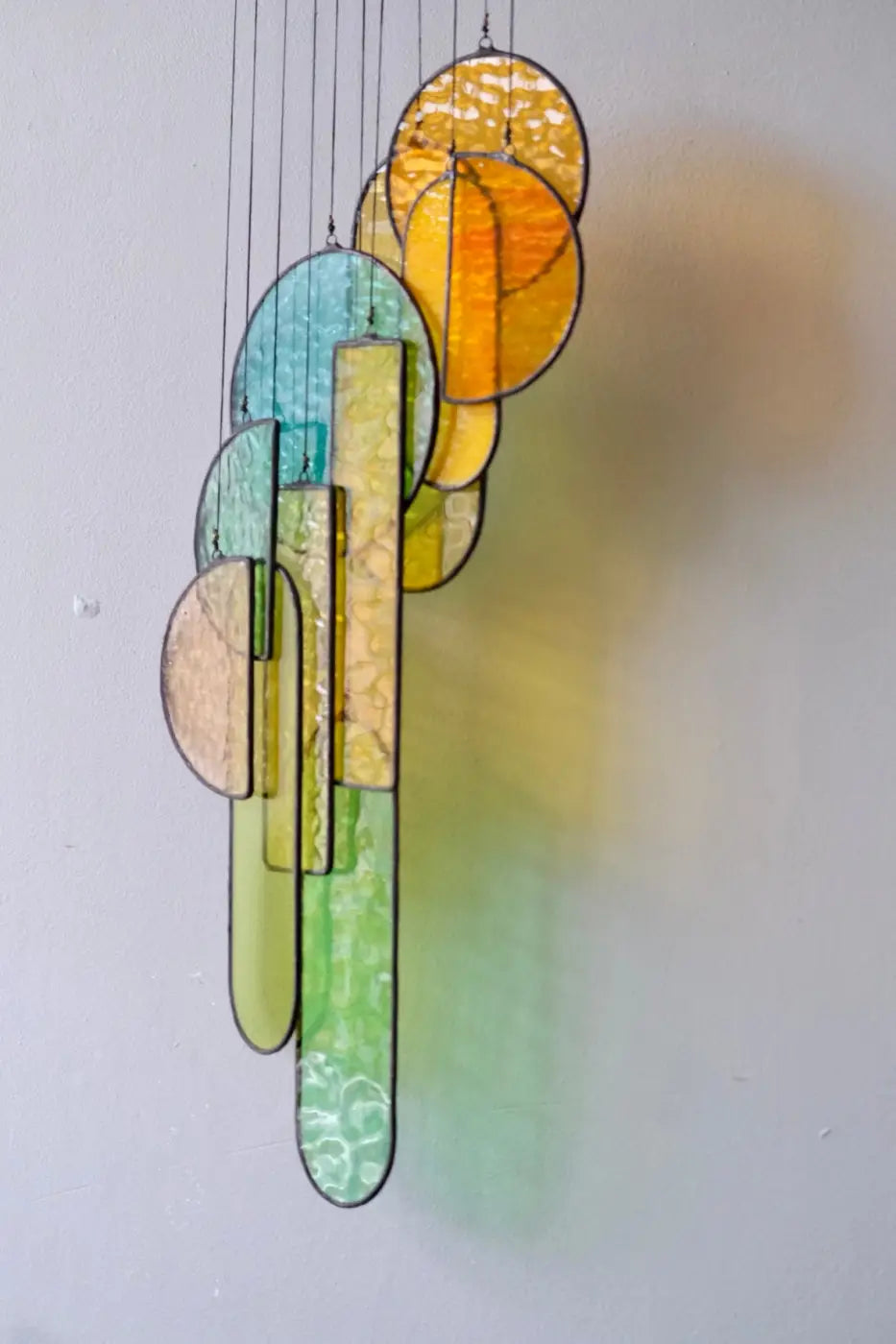 Autumn 2 stained glass hanging sculpture with colorful geometric shapes in yellow green and blue for decoration