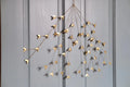 Handmade iron mistletoe large gold-toned metal butterfly wall hanging with delicate branching design