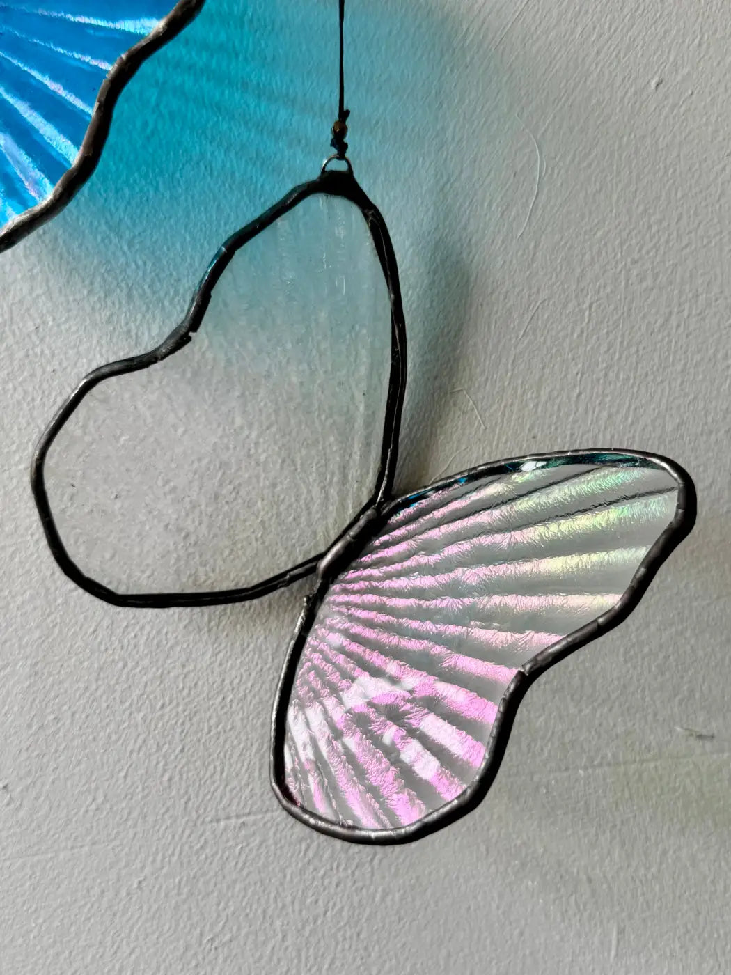 Morpho butterfly decorative sculpture stained glass ornament with iridescent pink silver wings and black leaded edges