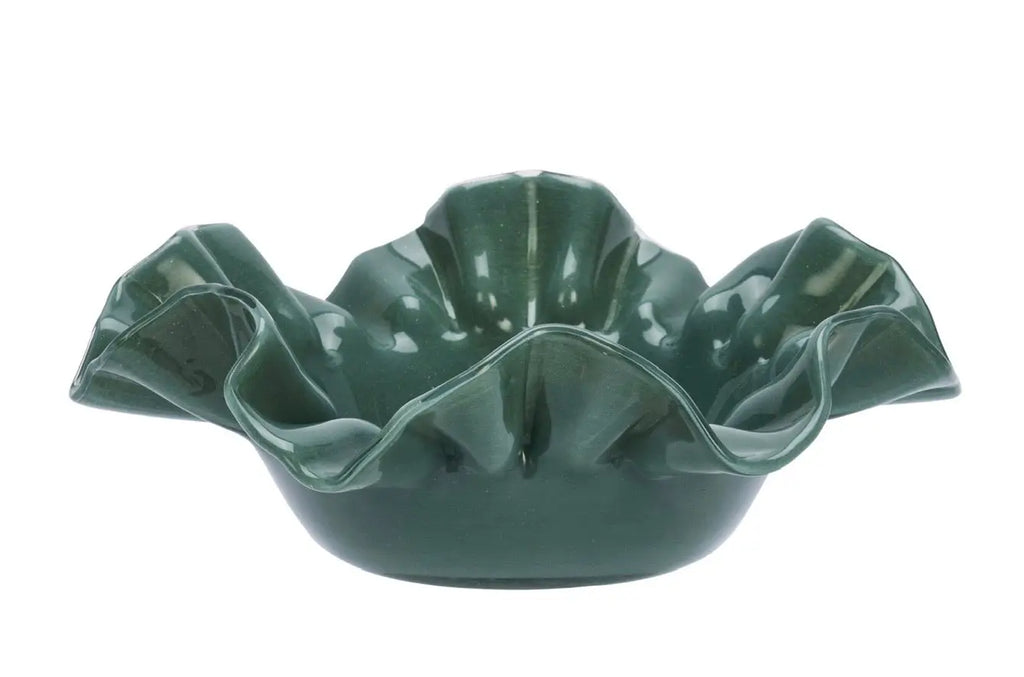 A glossy dark green ceramic ruffle glass bowl with a petal-like ruffled rim for decorative or serving use