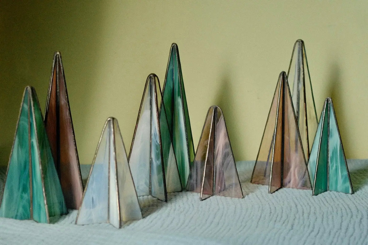 Sapin Trees set of three stained glass tree ornaments in green brown and translucent hues with metallic frames